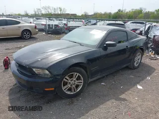 2012 Ford Mustang V6 Premium with VIN 1ZVBP8AM3C5274138, listed as a IAAI auction lot 42060091 with 228,384 mi miles. Bid and sale history available at carsss.com. Image 2.