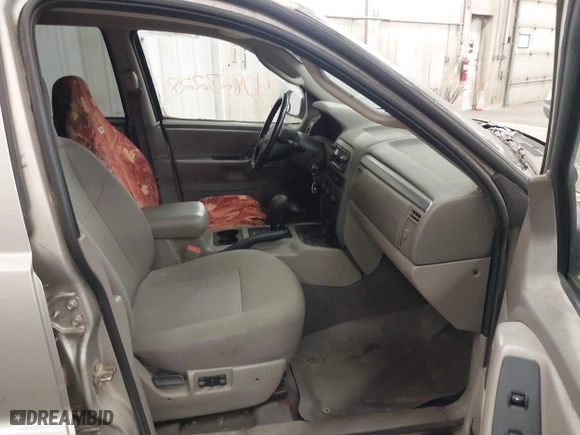 2003 Jeep Grand Cherokee Laredo with VIN 1J4GW48SX3C544237, listed as a IAAI auction lot 40823228 with 1 mi miles. Bid and sale history available at carsss.com. Image 5.