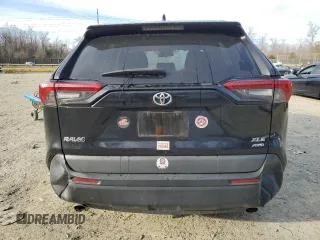 2020 Toyota RAV4 XLE with VIN 2T3P1RFV6LC101399, listed as a Copart auction lot 48256825 with 58,966 mi miles and Salvage Title. Bid and sale history available at DreamBid. Image 6.