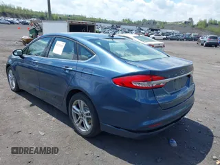 2018 Ford Fusion SE with VIN 3FA6P0HD2JR222690, listed as a IAAI auction lot 42172153 with 132,980 mi miles and . Bid and sale history available at DreamBid. Image 3.