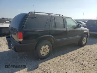 1999 Chevrolet Blazer Trailblazer z VIN 1GNDT13W2X2130625, wystawiony jako Copart lot #50596885 z przebiegiem 187 444 mil mil oraz Czysty tytuł • Clean title. Historia ofert i sprzedaży dostępna na DreamBid. Obrazek 3.