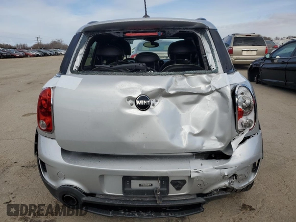 2016 MINI Countryman John Cooper Works with VIN WMWXD1C52GWT97652, listed as a Copart auction lot 49282345 with 51,983 mi miles and Salvage Title. Bid and sale history available at DreamBid. Image 6.