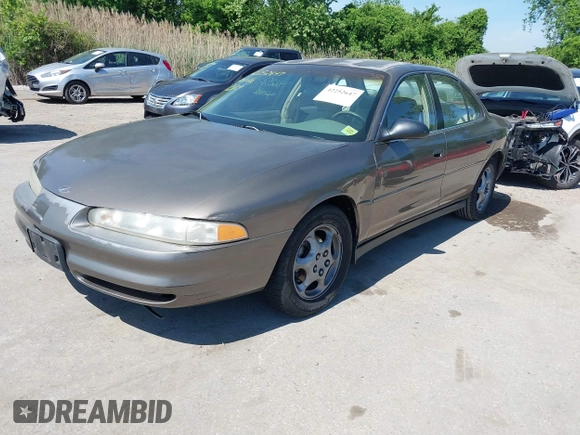 1999 Oldsmobile Intrigue GX z VIN 1G3WH52K5XF334949, wystawiony jako IAAI lot #42252647 z przebiegiem 80 705 mil mil oraz . Historia ofert i sprzedaży dostępna na DreamBid. Obrazek 2.