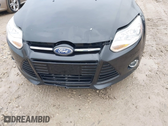 2012 Ford Focus SEL with VIN 1FAHP3M28CL336001, listed as a IAAI auction lot 40876771 with 147,017 mi miles. Bid and sale history available at carsss.com. Image 6.