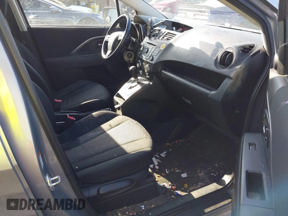 2012 Mazda 5 Sport z VIN JM1CW2BL3C0115906, wystawiony jako IAAI lot #42062899 z przebiegiem 124 286 mil mil oraz . Historia ofert i sprzedaży dostępna na DreamBid. Obrazek 5.