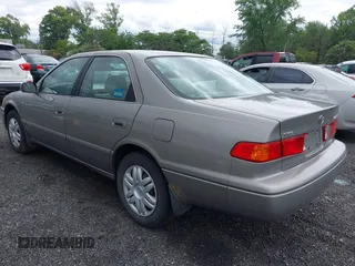 2001 Toyota Camry CE z VIN 4T1BG22K01U028448, wystawiony jako IAAI lot #42324384 z przebiegiem 190 325 mil mil oraz . Historia ofert i sprzedaży dostępna na DreamBid. Obrazek 3.