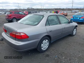2000 Honda Accord LX z VIN 1HGCG1649YA096212, wystawiony jako IAAI lot #41737193 z przebiegiem 181 489 mil mil oraz . Historia ofert i sprzedaży dostępna na DreamBid. Obrazek 4.