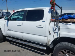 2016 Toyota Tacoma SR5 with VIN 5TFAX5GN8GX053836, listed as a IAAI auction lot 41973740 with 191,653 mi miles. Bid and sale history available at carsss.com. Image 13.
