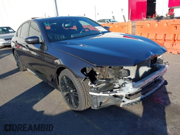 2018 BMW 5 Series 540i with VIN WBAJE5C58JG918692, listed as a IAAI auction lot 41665415 with 61,261 mi miles and . Bid and sale history available at carsss.com. Image 1.