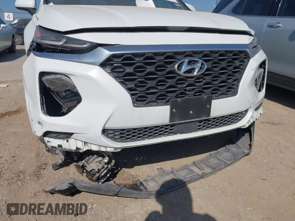 2019 Hyundai Santa Fe SE with VIN 5NMS23AD8KH051223, listed as a IAAI auction lot 42017754 with 146,704 mi miles and . Bid and sale history available at DreamBid. Image 6.