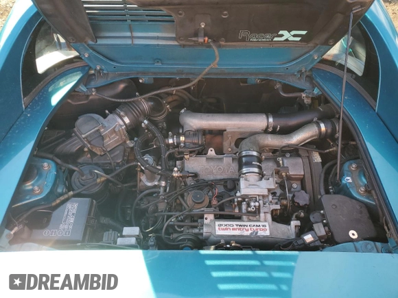 1993 Toyota MR2 z VIN JT2SW22N9P0078369, wystawiony jako Copart lot #87045224 z przebiegiem 240 232 mil mil oraz Szkoda całkowita • Salvage title. Historia ofert i sprzedaży dostępna na DreamBid. Obrazek 11.