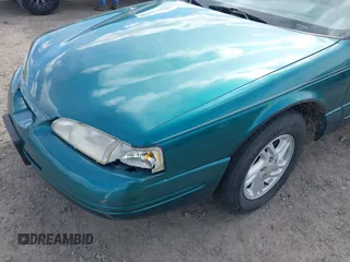 1997 Ford Thunderbird LX with VIN 1FALP62W7VH153454, listed as a IAAI auction lot 41833472 with 147,269 mi miles and . Bid and sale history available at DreamBid. Image 6.