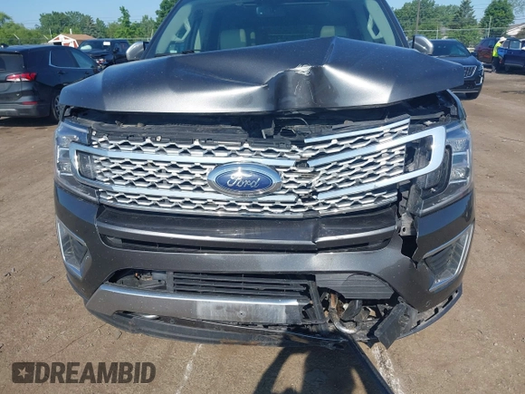 2021 Ford Expedition Max Platinum with VIN 1FMJK1MT8MEA66311, listed as a IAAI auction lot 42450429 with 95,732 mi miles and . Bid and sale history available at DreamBid. Image 6.