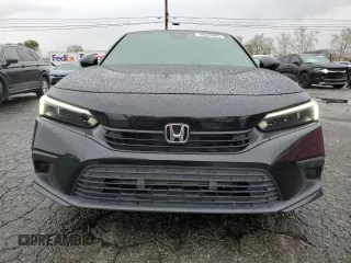 2023 Honda Civic Sedan Sport with VIN 2HGFE2F54PH529727, listed as a Copart auction lot 48689865 with 46,444 mi miles and Salvage Title. Bid and sale history available at carsss.com. Image 5.