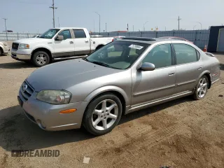 2002 Nissan Maxima GLE z VIN JN1DA31A62T000726, wystawiony jako Copart lot #71235864 z przebiegiem 219 647 mil mil oraz Szkoda całkowita • Salvage title. Historia ofert i sprzedaży dostępna na DreamBid. Obrazek 1.