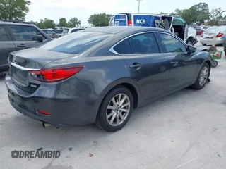 2016 Mazda 6 i Sport with VIN JM1GJ1U53G1409301, listed as a IAAI auction lot 42057930 with 100,434 mi miles and . Bid and sale history available at DreamBid. Image 4.