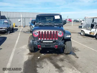 2018 Jeep Wrangler Unlimited Sport S with VIN 1C4HJXDG4JW149557, listed as a IAAI auction lot 42014833 with 54,472 mi miles. Bid and sale history available at carsss.com. Image 13.