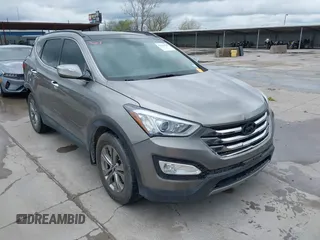2014 Hyundai Santa Fe with VIN 5XYZU3LB2EG155127, listed as a IAAI auction lot 41864518 with Not provided miles and . Bid and sale history available at DreamBid. Image 1.