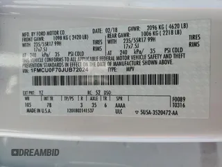 2018 Ford Escape S with VIN 1FMCU0F70JUB72024, listed as a Copart auction lot 49435525 with 97,421 mi miles and Salvage title. Bid and sale history available at DreamBid. Image 15.