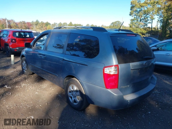 2009 Kia Sedona LX with VIN KNDMB233996320165, listed as a IAAI auction lot 40575451 with 122,057 mi miles. Bid and sale history available at carsss.com. Image 3.