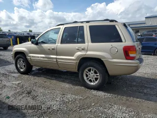 2000 Jeep Grand Cherokee Limited with VIN 1J4GW58N7YC327607, listed as a Copart auction lot 54711615 with 108,241 mi miles and Salvage title. Bid and sale history available at DreamBid. Image 2.