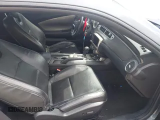 2014 Chevrolet Camaro LT z VIN 2G1FC1E31E9254364, wystawiony jako IAAI lot #42230839 z przebiegiem 102 036 mil mil oraz . Historia ofert i sprzedaży dostępna na DreamBid. Obrazek 5.