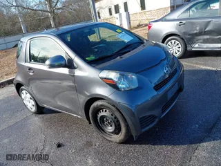 2014 Scion iQ with VIN JTNJJXB00EJ030409, listed as a IAAI auction lot 41352980 with 176,739 mi miles. Bid and sale history available at carsss.com. Image 1.
