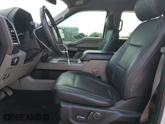 2018 Ford F-150 XL with VIN 1FTEW1E59JFA28036, listed as a Copart auction lot 57181525 with 121,384 mi miles and Salvage title. Bid and sale history available at DreamBid. Image 7.