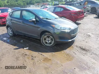 2019 Ford Fiesta SE z VIN 3FADP4EJ9KM125252, wystawiony jako IAAI lot #42221622 z przebiegiem 57 366 mil mil oraz . Historia ofert i sprzedaży dostępna na DreamBid. Obrazek 1.