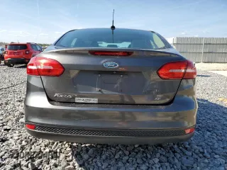 2018 Ford Focus SE with VIN 1FADP3F2XJL254344, listed as a Copart auction lot 54663115 with 84,850 mi miles and Salvage title. Bid and sale history available at DreamBid. Image 6.