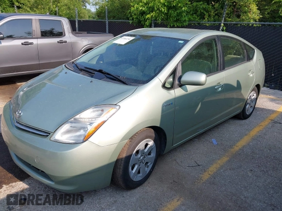 2007 Toyota Prius z VIN JTDKB20U877626737, wystawiony jako IAAI lot #42384250 z przebiegiem 128 560 mil mil oraz . Historia ofert i sprzedaży dostępna na DreamBid. Obrazek 2.