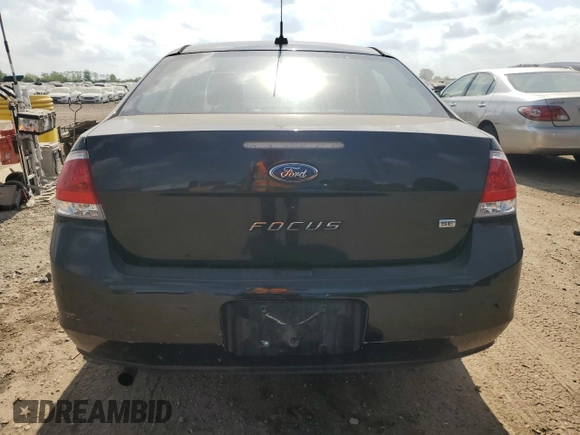 2008 Ford Focus SE z VIN 1FAHP35NX8W215744, wystawiony jako Copart lot #56096055 z przebiegiem 165 827 mil mil oraz Szkoda całkowita • Salvage title. Historia ofert i sprzedaży dostępna na DreamBid. Obrazek 6.
