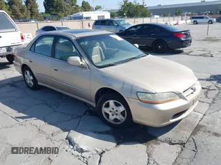 2000 Honda Accord EX with VIN 1HGCG1652YA063870, listed as a IAAI auction lot 42675999 with 234,835 mi miles and . Bid and sale history available at DreamBid. Image 1.