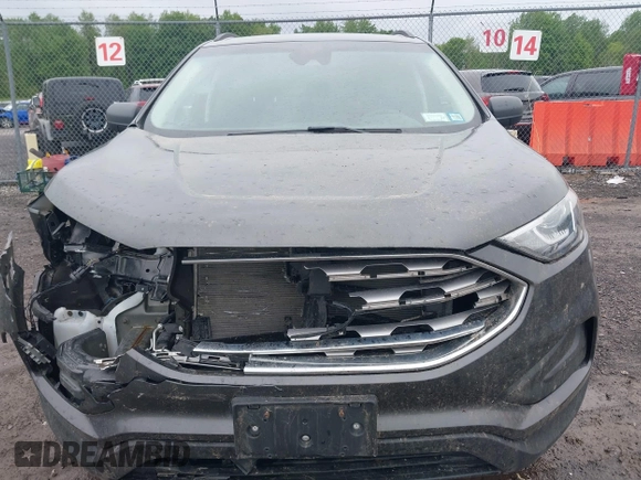 2020 Ford Edge SE z VIN 2FMPK4G94LBB18927, wystawiony jako IAAI lot #42332042 z przebiegiem 86 720 mil mil oraz . Historia ofert i sprzedaży dostępna na DreamBid. Obrazek 13.