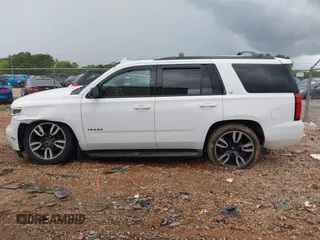 2018 Chevrolet Tahoe LT z VIN 1GNSKBKC9JR132670, wystawiony jako IAAI lot #42248273 z przebiegiem 136 636 mil mil oraz . Historia ofert i sprzedaży dostępna na DreamBid. Obrazek 14.
