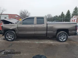 2015 Chevrolet Silverado 1500 LT with VIN 1GCVKREC9FZ237338, listed as a IAAI auction lot 41897225 with 154,229 mi miles and . Bid and sale history available at DreamBid. Image 14.