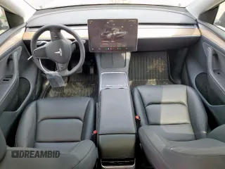 2024 Tesla Model Y Long Range with VIN 7SAYGDEE2RA287446, listed as a Copart auction lot 57640895 with 27,932 mi miles and Salvage title. Bid and sale history available at DreamBid. Image 8.