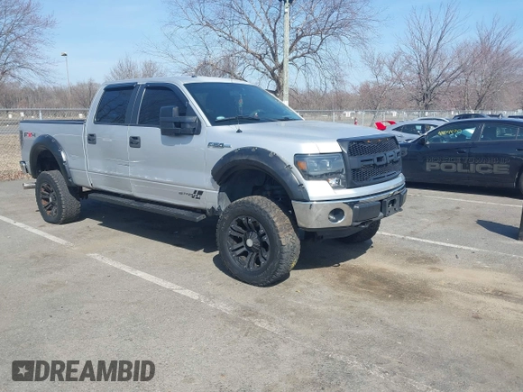 2014 Ford F-150 with VIN 1FTVW1EFXEKD65059, listed as a IAAI auction lot 41791605 with 146,190 mi miles and . Bid and sale history available at DreamBid. Image 1.