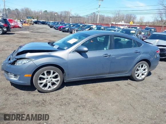 2009 Mazda 6 S Grand Touring with VIN 1YVHP82B795M01762, listed as a IAAI auction lot 41925269 with 163,967 mi miles and . Bid and sale history available at DreamBid. Image 14.