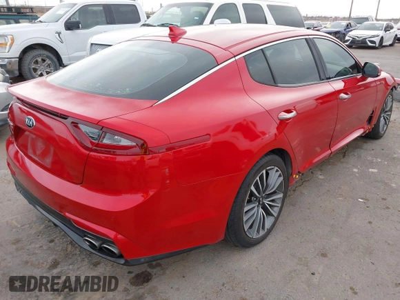 2019 Kia Stinger with VIN KNAE15LA1K6056093, listed as a IAAI auction lot 41620911 with 99,295 mi miles and . Bid and sale history available at DreamBid. Image 4.