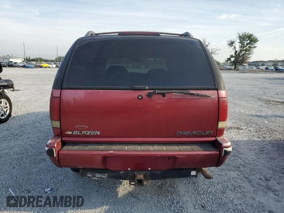 1996 Chevrolet Blazer z VIN 1GNCS13W7T2150216, wystawiony jako Copart lot #54006685 z przebiegiem 1 518 487 mil mil oraz Szkoda całkowita • Salvage title. Historia ofert i sprzedaży dostępna na DreamBid. Obrazek 6.