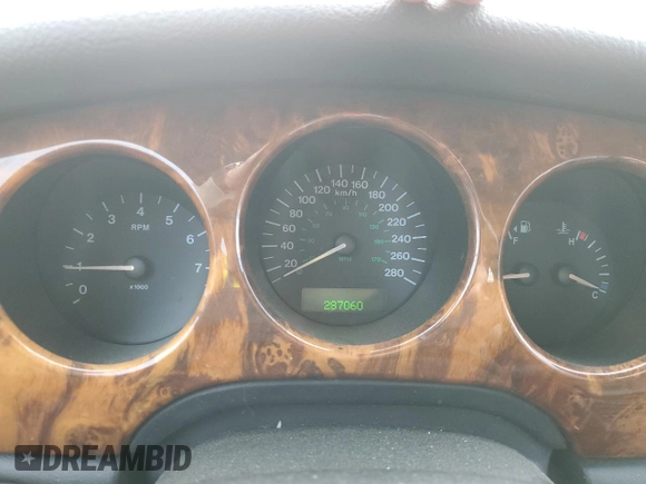 2002 Jaguar XJ with VIN SAJFA12C72LF47096, listed as a Copart auction lot 79412794 with 287,060 mi miles and Clean Title. Bid and sale history available at DreamBid. Image 9.