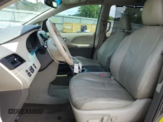 2014 Toyota Sienna XLE with VIN 5TDYK3DC6ES456558, listed as a Copart auction lot 63106085 with 231,260 mi miles and Salvage title. Bid and sale history available at DreamBid. Image 7.