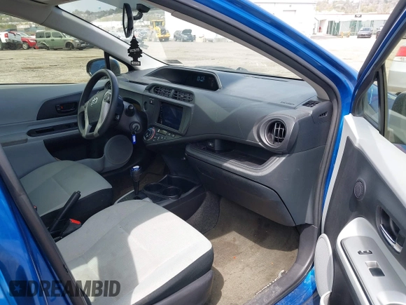 2014 Toyota Prius One with VIN JTDKDTB33E1565723, listed as a IAAI auction lot 42070826 with 145,811 mi miles and . Bid and sale history available at DreamBid. Image 5.