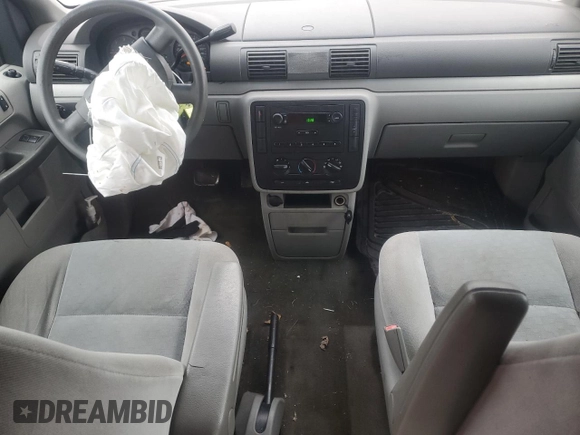 2007 Ford Freestar Cargo с VIN 2FTZA54627BA18587, выставлен на аукционе Copart как лот 84150524 с пробегом 162 761 миль миль и Списание • Salvage title. История ставок и продаж доступна на DreamBid. Изображение 8.