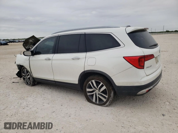 2017 Honda Pilot Touring with VIN 5FNYF5H95HB015365, listed as a Copart auction lot 52371205 with 153,141 mi miles and Salvage title. Bid and sale history available at DreamBid. Image 2.