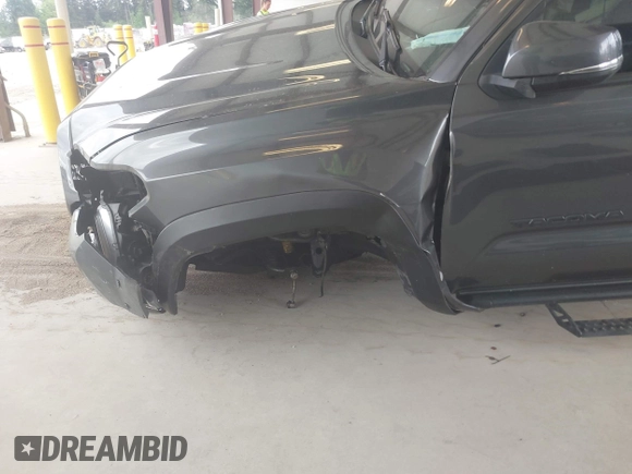 2019 Toyota Tacoma SR z VIN 3TMCZ5AN1KM257081, wystawiony jako IAAI lot #42211385 z przebiegiem 60 229 mil mil oraz . Historia ofert i sprzedaży dostępna na DreamBid. Obrazek 6.