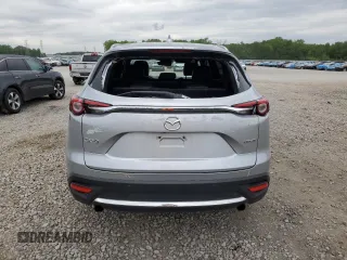2021 Mazda CX-9 Carbon Edition с VIN JM3TCADY3M0517512, выставлен на аукционе Copart как лот 54240715 с пробегом 89 599 миль миль и Списание • Salvage title. История ставок и продаж доступна на DreamBid. Изображение 6.