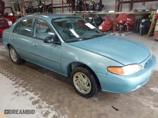 1997 Ford Escort LX with VIN 1FALP13P1VW129544, listed as a IAAI auction lot 42060399 with 185,727 mi miles. Bid and sale history available at carsss.com. Image 1.