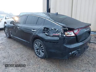 2019 Kia Stinger with VIN KNAE15LA6K6069504, listed as a IAAI auction lot 41031373 with 81,577 mi miles. Bid and sale history available at carsss.com. Image 3.